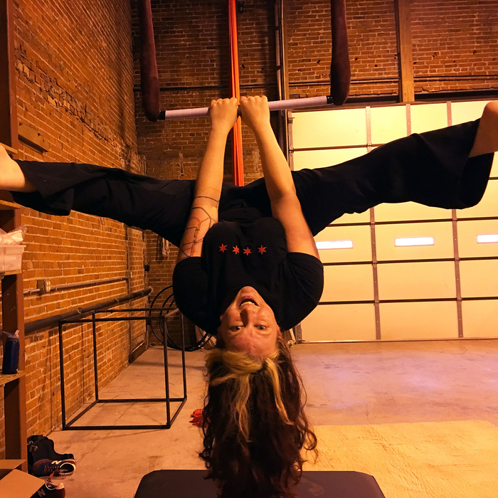 Alison straddle under trapeze